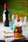 Ingredients for sangria in a glass jar — Stock Photo