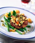Fillet steak and new potatoes — Stock Photo