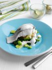 Steamed cod sprouting broccoli, new potatoes, broad beans, leeks and cappuccino sauce — Stock Photo