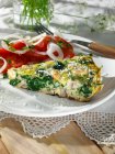 Frittata with mushrooms spinach onions and cashews — Stock Photo
