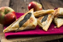 Apple turnovers with sage leaves — Stock Photo