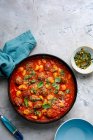 Tomato soup with meatballs and gnocchi with basil pesto — Stock Photo