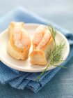 Prawns cocktail in little flaky pastry fish — Stock Photo