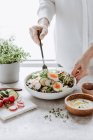 Salad with cucumber, radish sprouts and egg — Stock Photo