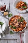 Pasta with tomatoes, basil, and parmesan cheese - foto de stock
