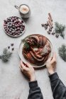 Christmas cinnamon wreath decorated with cranberries — Stock Photo