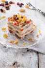 Colorful pieces of cake with dried fruits and nuts — Stock Photo