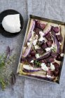 Baked potatoes and turnips violets — Stock Photo