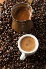 Greek coffee with beans — Stock Photo