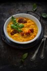 Risotto with pumpkin and sun-dried tomatoes — Stock Photo