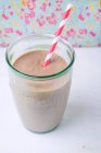 Chocolate Tofu Smoothie with Floral backround — Stock Photo