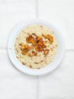 Risotto with chanterelle mushrooms (seen from above) — Stock Photo