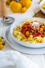 Tagliatelle pasta with tuna, vegetables and cheese — Stock Photo