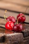 Cherries on a wooden crate — Stock Photo