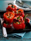 Stuffed peppers with cherry tomatoes and basil — Stock Photo