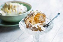 Meringue cake in a crystal bowl — Stock Photo