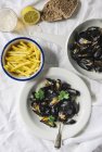 Mussels with fries (seen from above) — Stock Photo