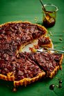 Sliced caramel and pecan tart — Stock Photo