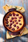Close-up shot of delicious Cherry clafoutis batter pudding — Stock Photo