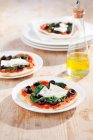 Goat's cheese and spinach pizza — Stock Photo