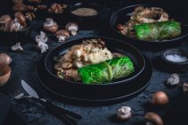 Vegetarian savoy cabbage roulade with mushrooms and mashed potatoes — Stock Photo