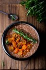 Spicy stew with vegetables and herbs. selective focus. — Stock Photo