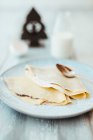 Crepes with nut and nougat cream for Christmas — Stock Photo