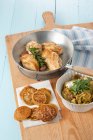 Pan fried chicken breasts with lentil pancakes and leek curry — Stock Photo