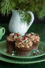 Christmas sprinkles chocolate cupcakes — Stock Photo