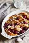 Cherry ofenschlupfer (bread pudding) with almonds — Stock Photo