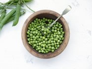 Freshly shelled peas close-up view — Stock Photo