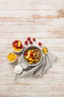Museli with Raspberries Peaches and Chocolate Pieces — Stock Photo