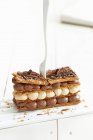 A millefeuille with dark and white chocolate cream — Stock Photo
