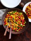 Sweetcorn with spring onions and roasted red pepper — Stock Photo