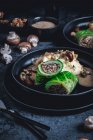 Vegetarian savoy cabbage roulade with mushrooms and mashed potatoes — Stock Photo