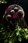 Fresh organic vegetables on a black background — Stock Photo
