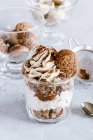 Chocolate macarons, ganache and vanilla whipped cream trifle — Stock Photo