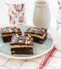 Cappuccino brownies with chopped nuts — Stock Photo