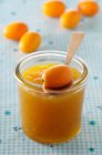 A glass of kumquat jam — Stock Photo