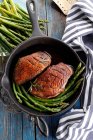Roast duck breast with green asparagus — Stock Photo