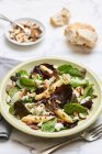 Mixed leaf salad with white asparagus tips and sheep's cheese — Stock Photo