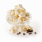 Popcorn with long pepper and salt — Stock Photo