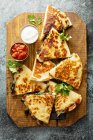Mushroom, spinach and cheese quesadillas with sour cream and salsa — Stock Photo
