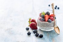 Chia pudding with berries in a glass — Stock Photo