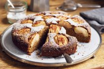 Sunken apple cake with wholemeal flour and coconut blossom sugar, sliced — Stock Photo