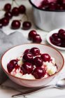 Cherry rice pudding close-up view — Stock Photo