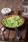 A flour-free spring tart with steamed asparagus, peas, goat's cheese, cress and Parmesan — Stock Photo