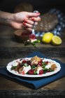 Raspberry and asparagus salad with ricotta and sourdough bread chips — Stock Photo
