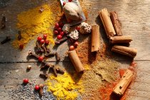 Various oriental spices on a wooden table — Stock Photo