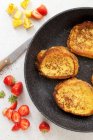Vegan French toast in a pan with pineapple and strawberries — Stock Photo